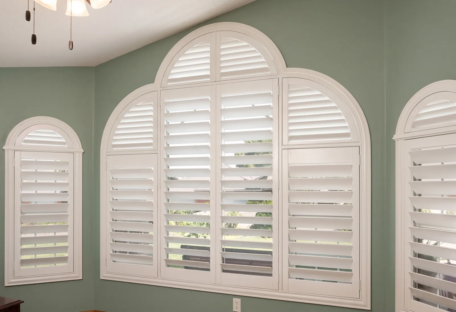 Custom arched plantation shutters in a Queen Creek, Arizona home