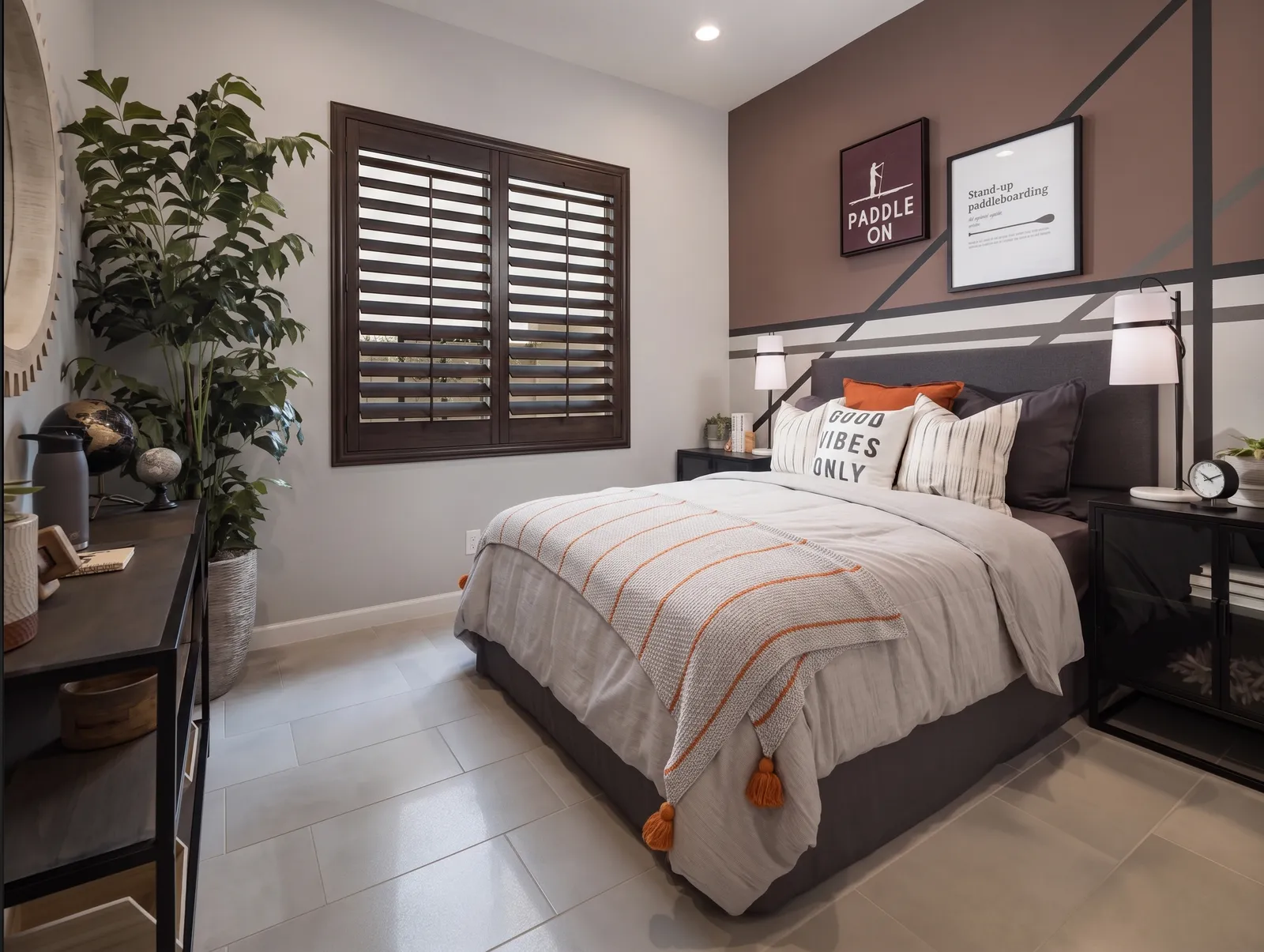 Dark-stained wood plantation shutters in a Scottsdale, Arizona bedroom