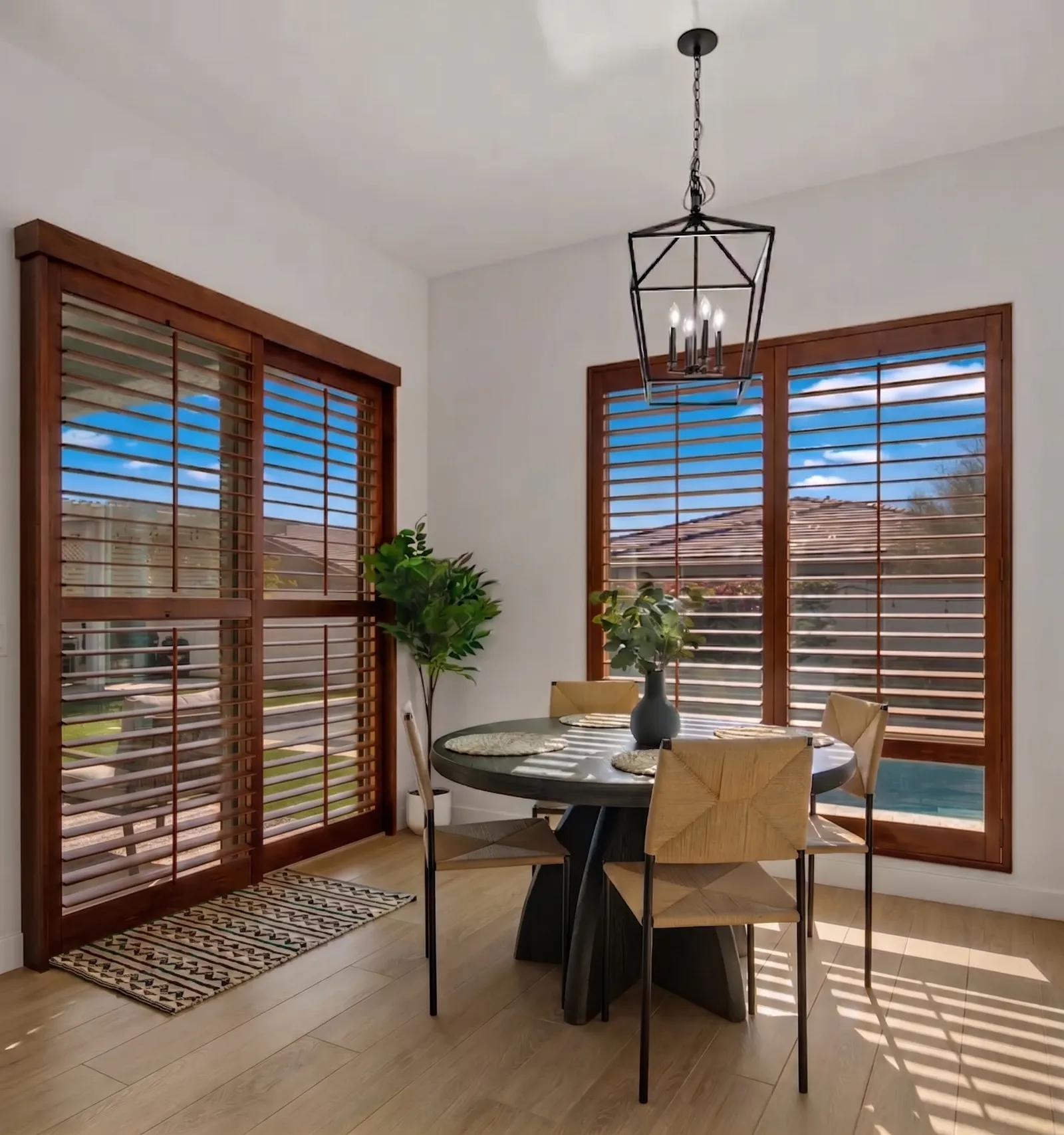 Wood plantation shutters on a patio door in a Phoenix, Arizona home