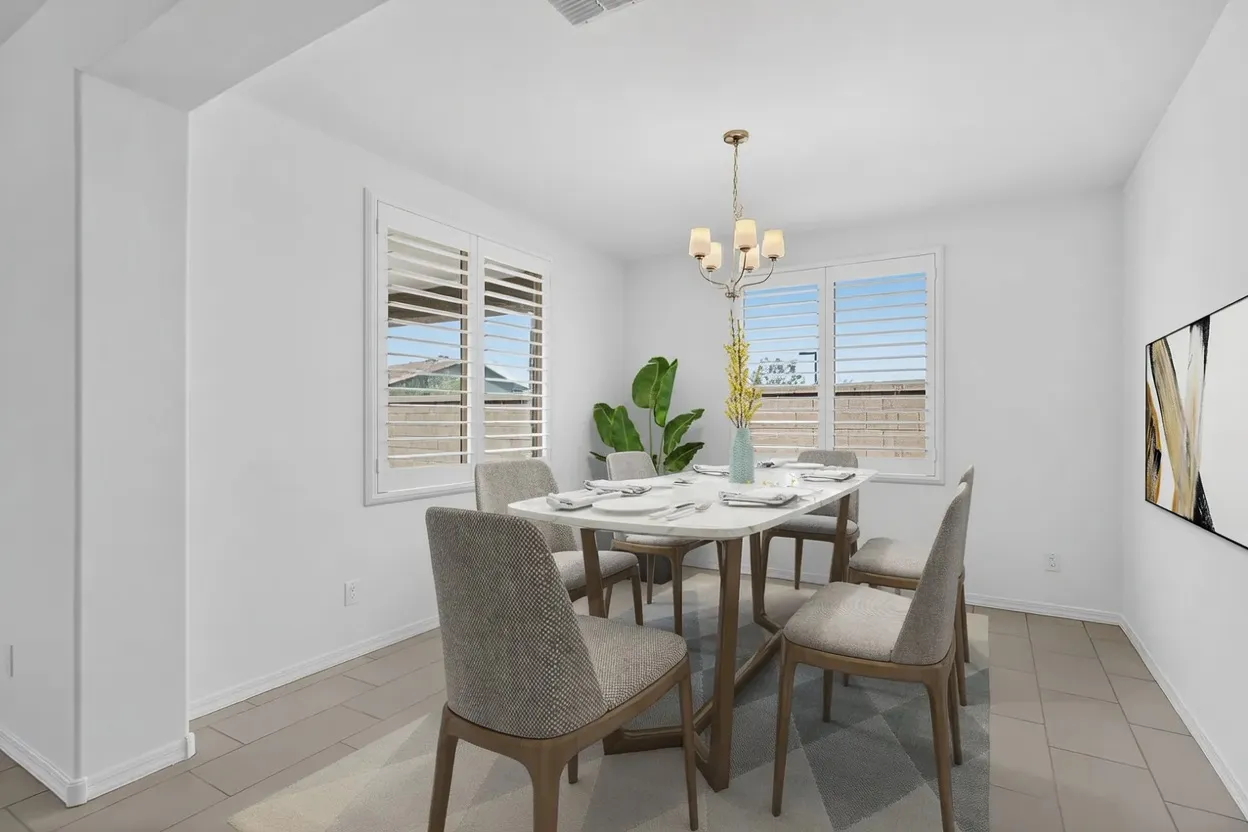White composite plantation shutters on corner windows in a Glendale, Arizona dining room