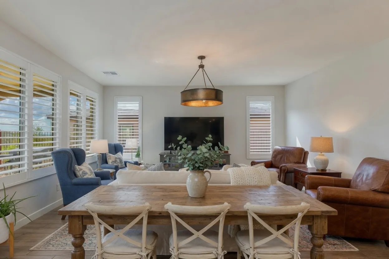 White composite plantation shutters with hidden tilt on view windows in a Wickenburg, Arizona great room