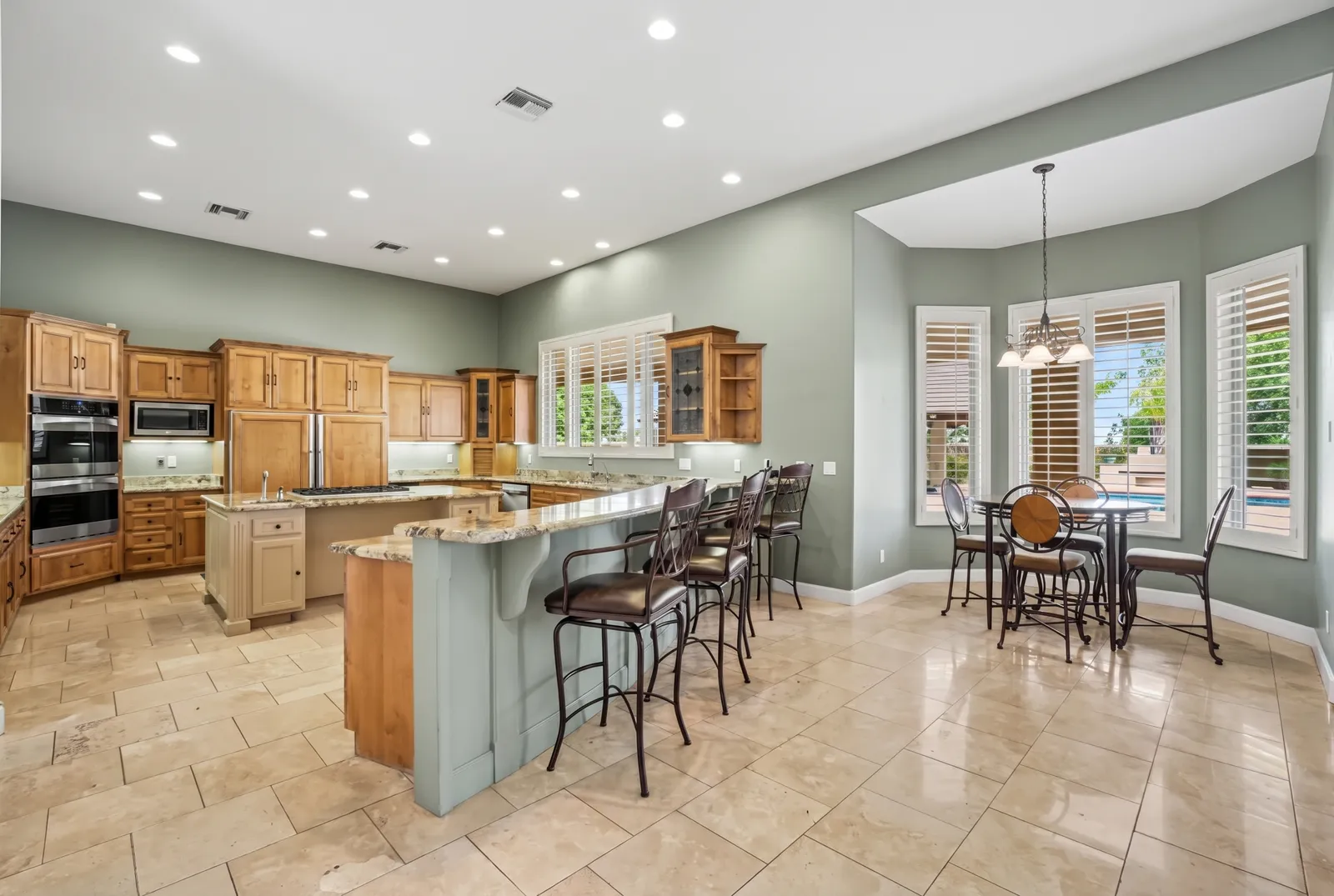 White plantation shutters with wide louvers in a Surprise, Arizona kitchen