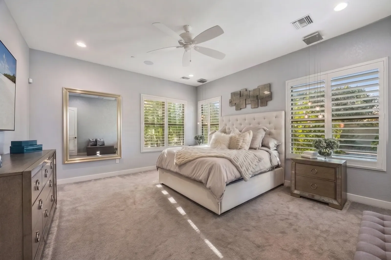 White composite plantation shutters in a Phoenix, Arizona primary bedroom