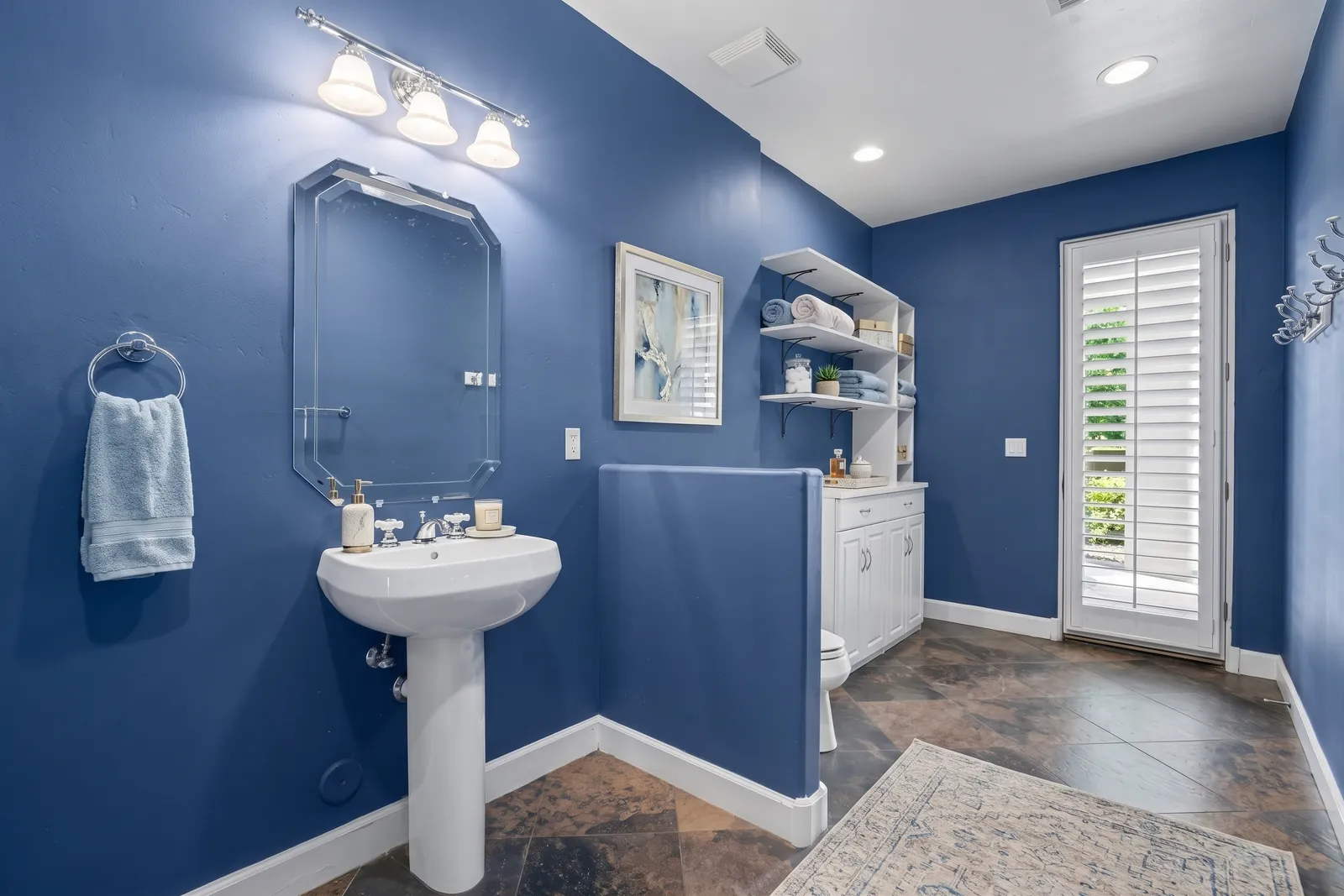 White plantation door shutters closed cleanly in a Goodyear, Arizona home