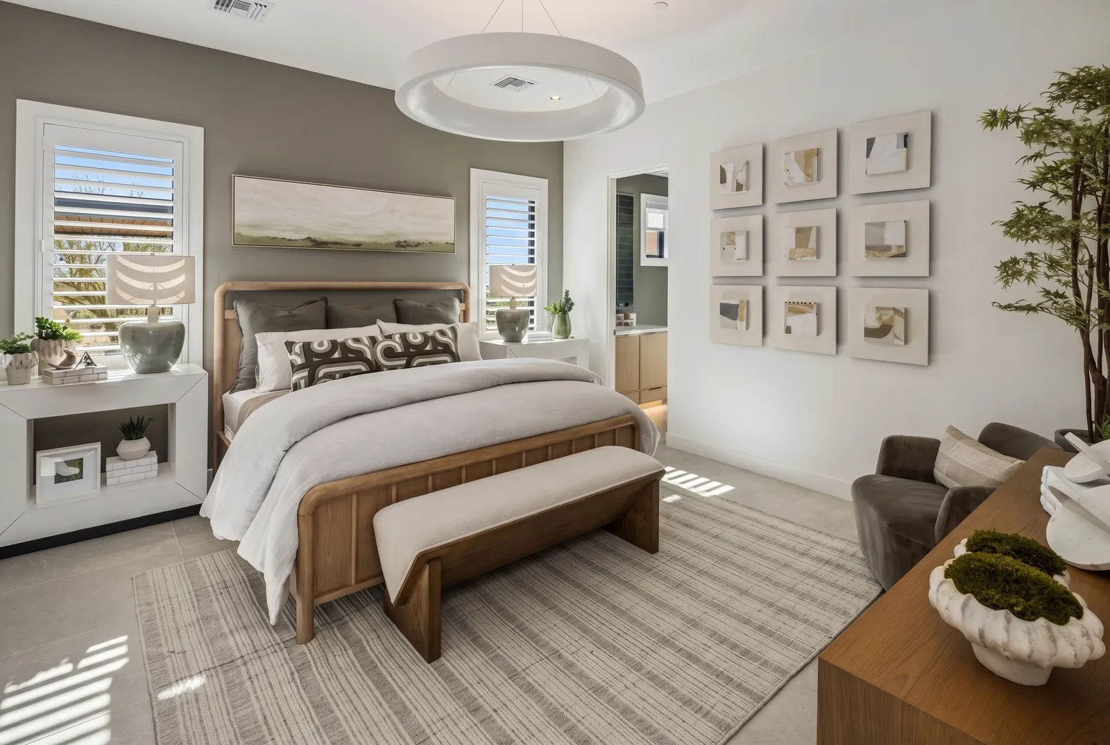 White plantation shutters in an Arizona primary bedroom